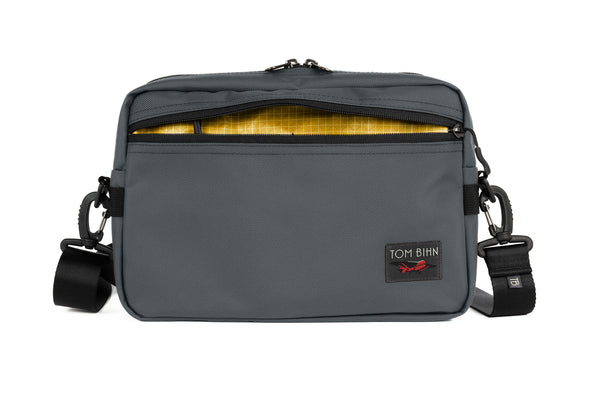 The Side Hustle in Nebulous Grey Ballistic with Solaris (yellow) 200 Halcyon interior.